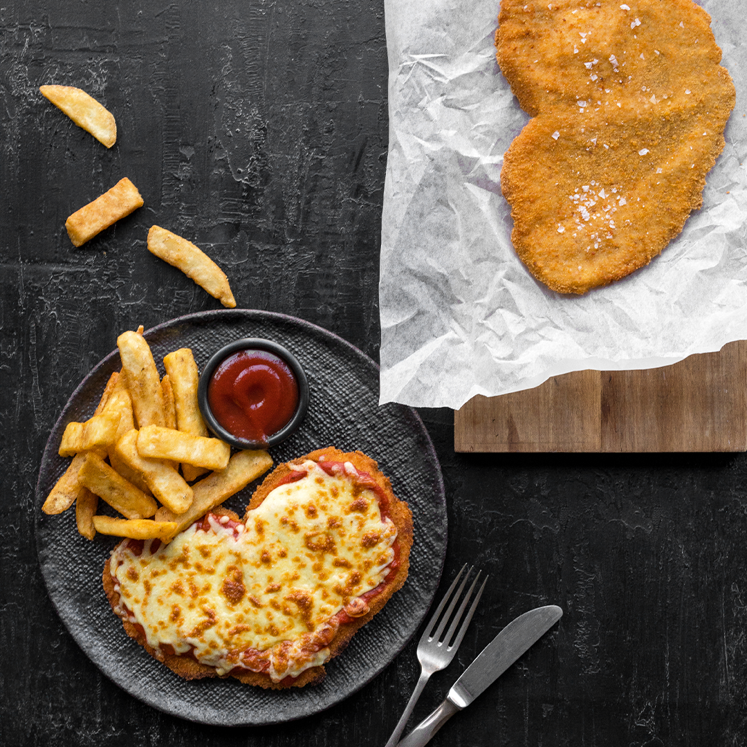 Hand-cut chicken parmigiana & schnitzel
